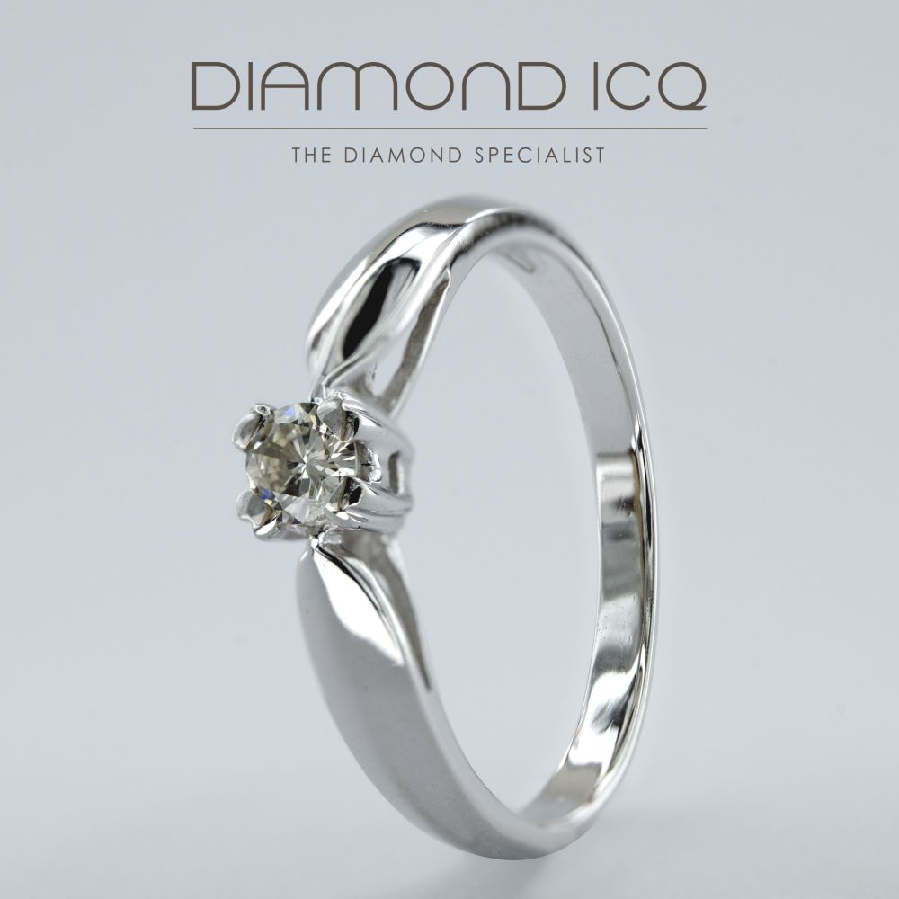 18K White Gold Solitaire Diamond Ring with 0.12 Carat Diamond